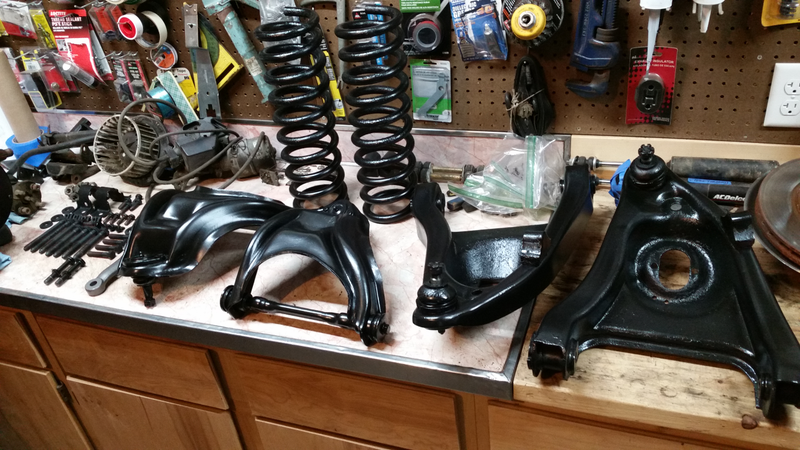 Not everything is finished, the shocks are still dirty, and other unrelated odds and ends are still in the “clean-up” queue. Yes there’s some pitting in the spring pocket on the lower arms, but nothing major.